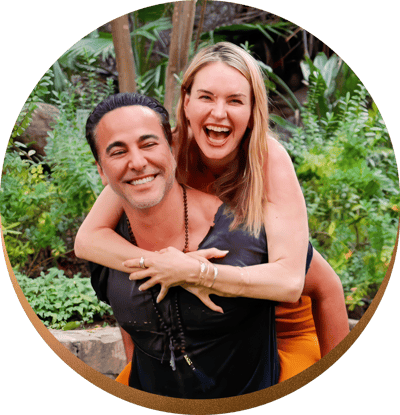 Layla Martin in a playful piggyback with her partner Baback Amen