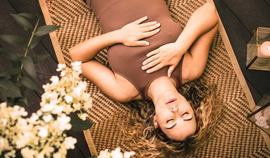 Woman lying peacefully with her eyes closed