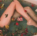 girl-laying-in-the-flower-bath