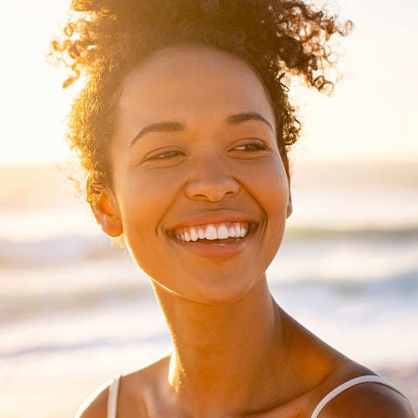 smiling woman at beach